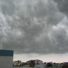 A photo of dark stormy monsoon clouds over the city of Lucknow,India.