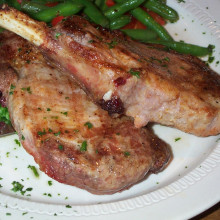 A plate of cooked pork chops. Photo courtesy of Stu Spivack