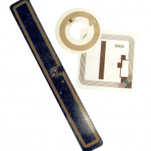 RFID tags used in libraries: square book tag, round CD/DVD tag and rectangular VHS tag