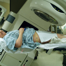 Radiation therapy of the pelvis. Lasers and a mould under the legs are used to determine exact position. Radiation therapy of the pelvis. Lasers and a mould under the legs are used to determine exact position.