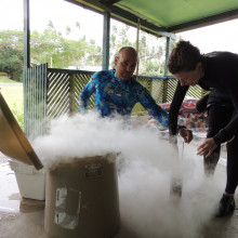 Josh Drew and Helen Scales preserving seagrass samples in liquid nitrogen in Fiji.