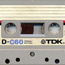 A TDK D-60 cassette A TDK D-60 cassette, a common speech-quality tape with a 60-minute playing time, in a housing similar to that of the original Compact Cassette specification