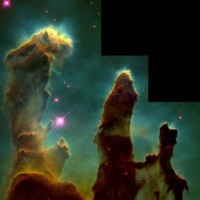 Figure 2: The Eagle Nebula. On 1 April 1995, the Hubble took this famous photograph of pillar-like structures in the Eagle Nebula. These pillars are actually columns of interstellar hydrogen gas and dust that lead to star formation.