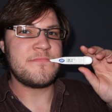 Ben with the thermometer in his mouth Ben with the thermometer in his mouth in the same place as the mint. A man born to smoke the pipe, but he doesn't smoke.