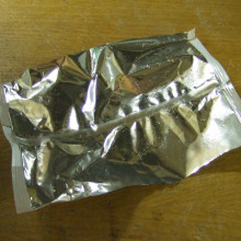 A crisp packet with a shiny aluminium foil