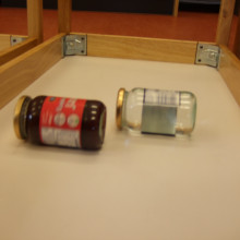 A race between jam and water filled jars