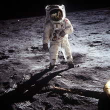 An astronaut standing on the Moon's surface