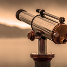 A telescope with a sepia filter over the image
