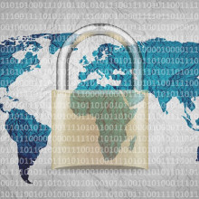 A padlock, superimposed over a map of the world, with binary code written across it.