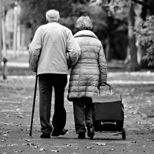 Couple walking down street