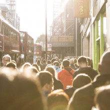 A crowd on a busy London street.