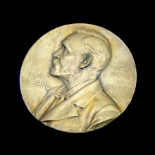 A Nobel Prize on a black background