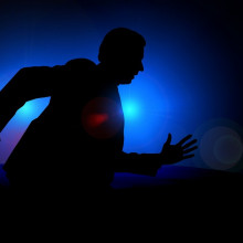 Business man A silhouetted business man running to a meeting...