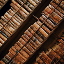 Old books packed on bookshelves