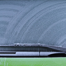 A frozen car windshield.