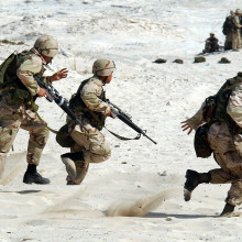 Soldiers in combat on the battlefield Soldiers in combat on the battlefield