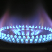 A Close up of a lit gas burner cooker