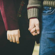 Couple holding hands