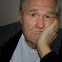 photo of a man looking bored