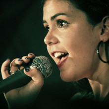 A woman singing A woman singing