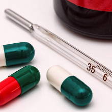 Thermometer and pills Thermometer and pills