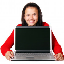 young person with a computer