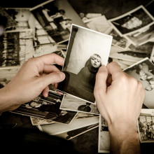 Man looking at photos