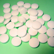 A pile of round pills / tablets