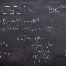 Fourier series equations written on a blackboard.