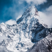 Pointed mountain covered in snow