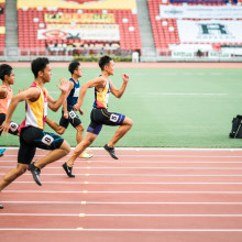 a group of runners on a track