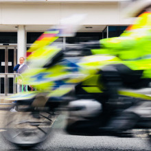 Police motorcyclist in hi-vis jacket Police motorcyclist in hi-vis jacket