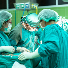 An operating theatre team performing surgery