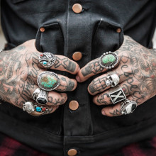 Hands covered in tattoos