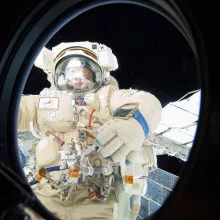 An astronaut on a spacewalk