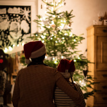 Father and son with Christmas Tree
