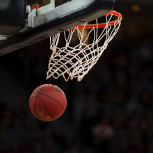 Basketball going through a hoop