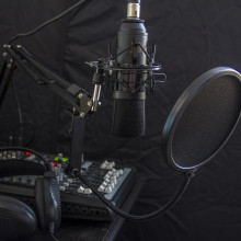 A microphone and mixer recording desk