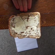 Push the toast off the table at a nice steady speed.