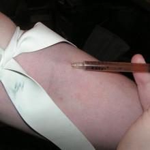 Injecting heroin intravenously