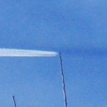 What is the dark line extending in front of the plane?