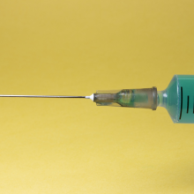 Syringe and needle for administering injections