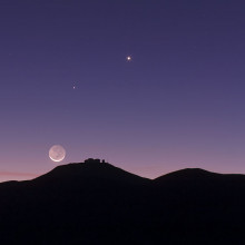 The crescent Moon and earthshine over ESO's Paranal Observatory.